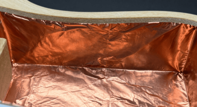 Copper tape shielding inside guitar cavity