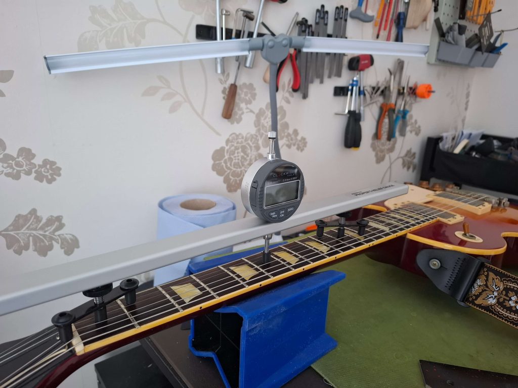 Setting a guitar neck straight with the Proper Relief Gauge